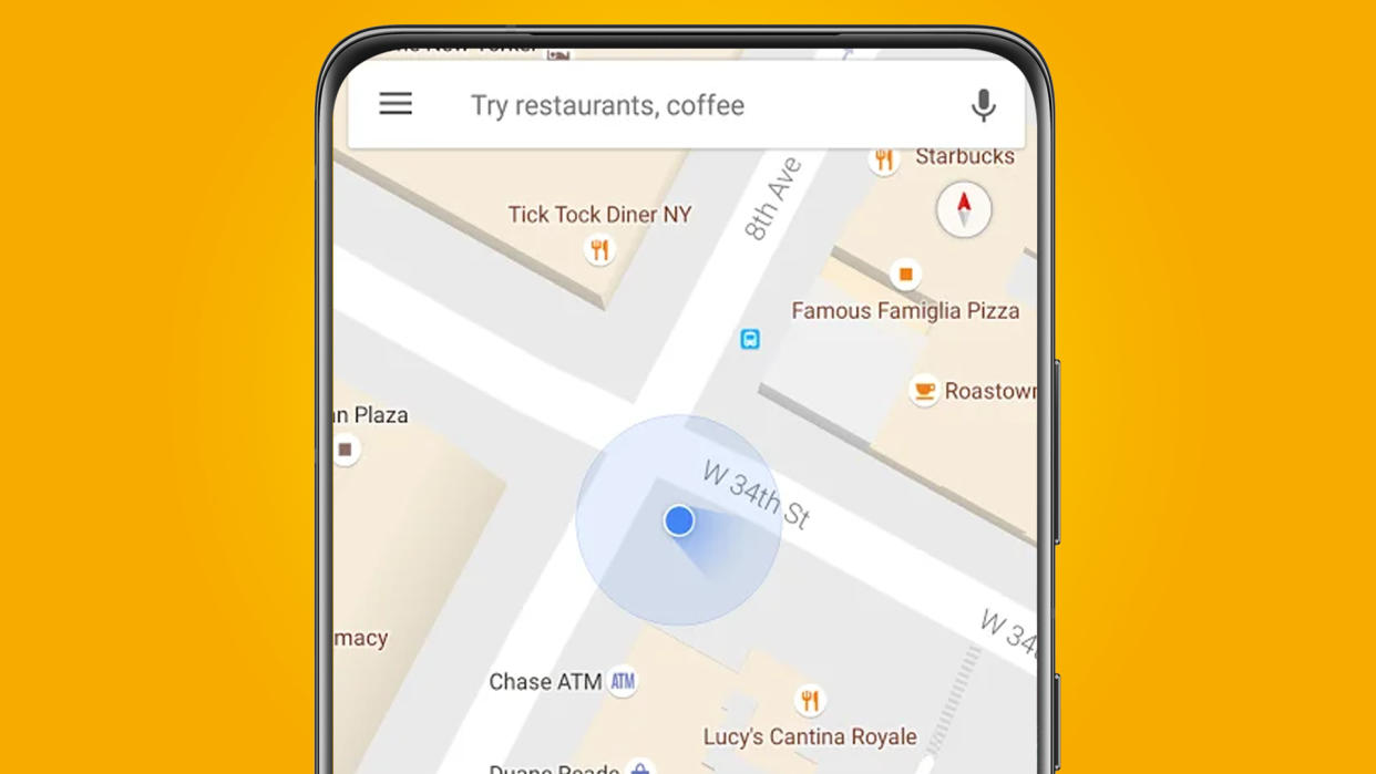  A phone on an orange background showing Google Maps. 