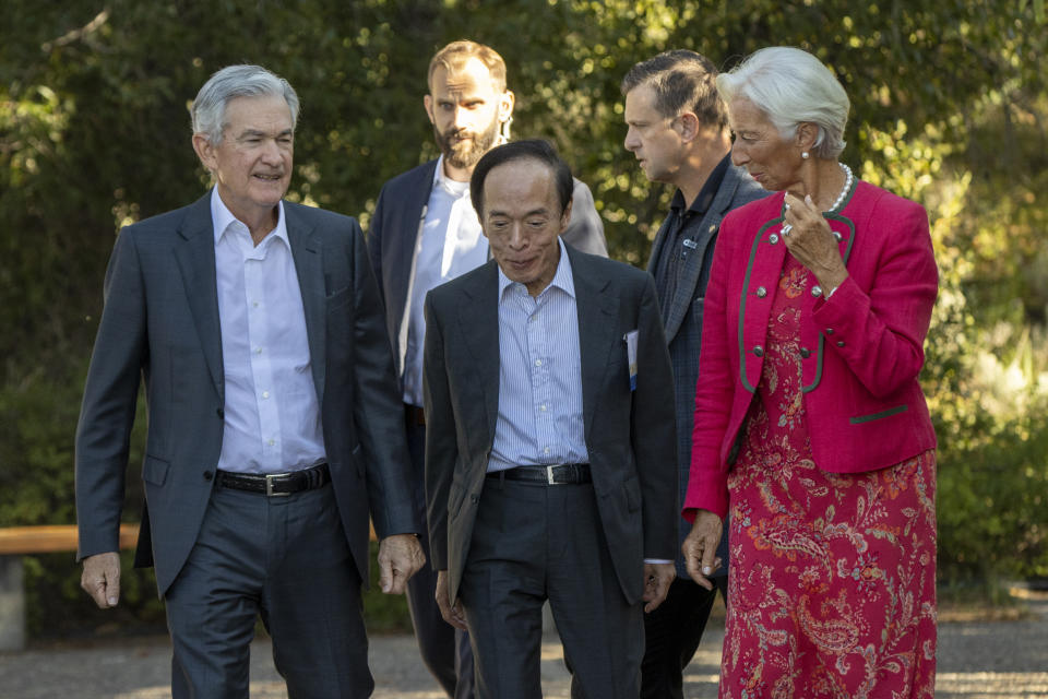 JACKSON HOLE, WYOMING - AUGUST 25: President of the European Central Bank Christine Lagarde, Bank of Japan Gov. Kazuo Ueda (C), and chair of the Federal Reserve Jerome Powell (L) speak during the Jackson Hole Economic Symposium at Jackson Lake Lodge on August 25, 2023 near Jackson Hole, Wyoming. Powell signaled in a speech Friday morning that if necessary, interest rates could be raised again. (Photo by Natalie Behring/Getty Images)