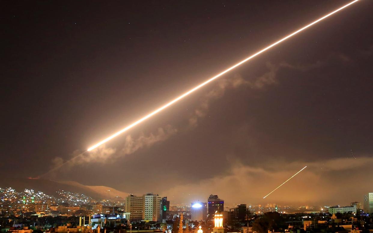 Damascus skies erupt with service to air missile fire as the U.S. launches an attack on Syria targeting different parts of the Syrian capital Damascus - AP