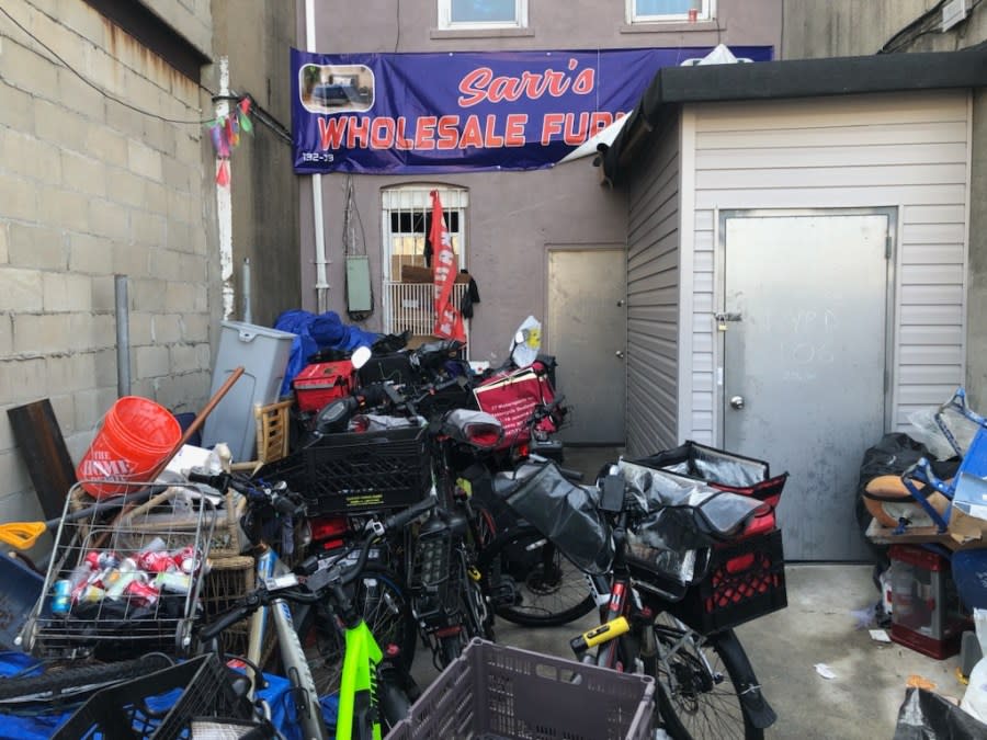 The backyard at 132-03 Liberty Ave. in Richmond Hill, where 87 people were allegedly living in the basement and later taken to a migrant shelter, according to sources. (Credit: PIX11 News)