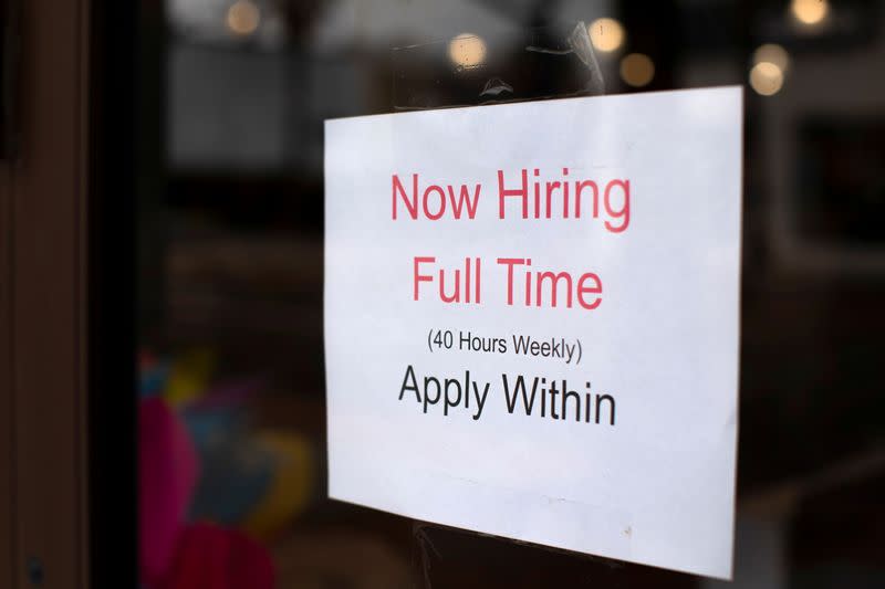 FILE PHOTO: A retail store advertising a full time job on its shop window in Oceanside, California,