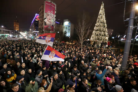 Demonstrators holding Serbian flags attend an anti-government protest in central Belgrade, Serbia, December 29, 2018. REUTERS/Marko Djurica