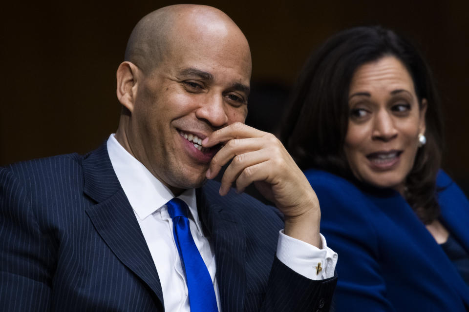 Sen. Cory Booker, D- N.J., speaks with Sen. Kamala Harris, D-Calif., during a Senate Judiciary Committee hearing on police use of force and community relations on on Capitol Hill, Tuesday, June 16, 2020 in Washington. (Tom Williams/CQ Roll Call/Pool via AP)