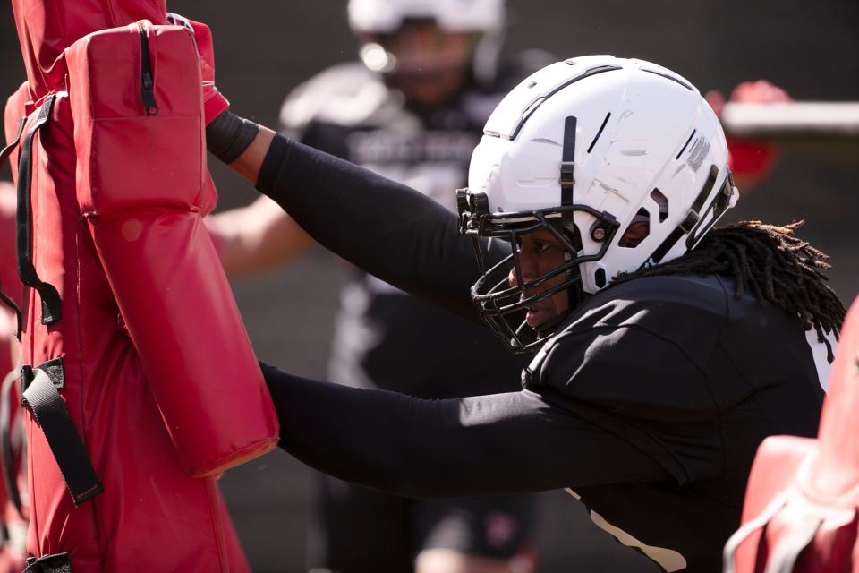 Terrell Tilmon goes through a drill during spring football practice. The sophomore from Mansfield Timberview is one of several defensive edge players trying to win spots in the two-deep with the departure of NFL draft entrant Tyree Wilson and the move of Jesiah Pierre to inside linebacker.