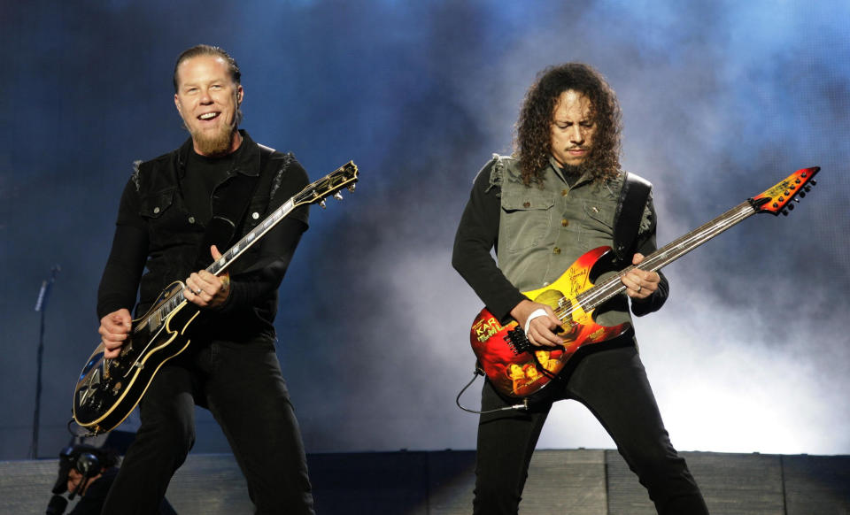 James Hetfield (left) and Kirk Hammett of Metallica perform on day three of the Reading Festival 2008, Berkshire.