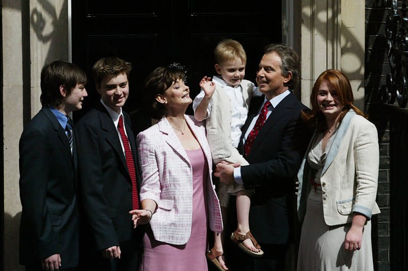 British Prime Minister Tony Blair stands with his family (L-R) Nicky, Euan, Cherie, Leo and Katherine, at No.10 Downing St. after winning a record third term in power on May 6, 2005. File Photo by Hugo Philpott/UPI