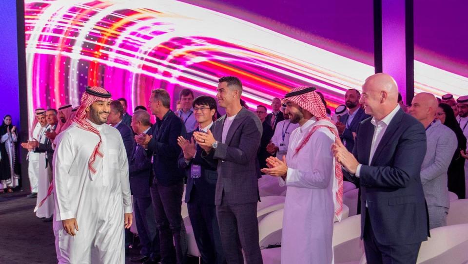 Saudi Crown Prince Mohammed bin Salman with Al Nassr's Cristiano Ronaldo, FIFA president Gianni Infantino and Saudi sports minister Prince Abdul Aziz bin Turki Al-Faisal (Handout via REUTERS)