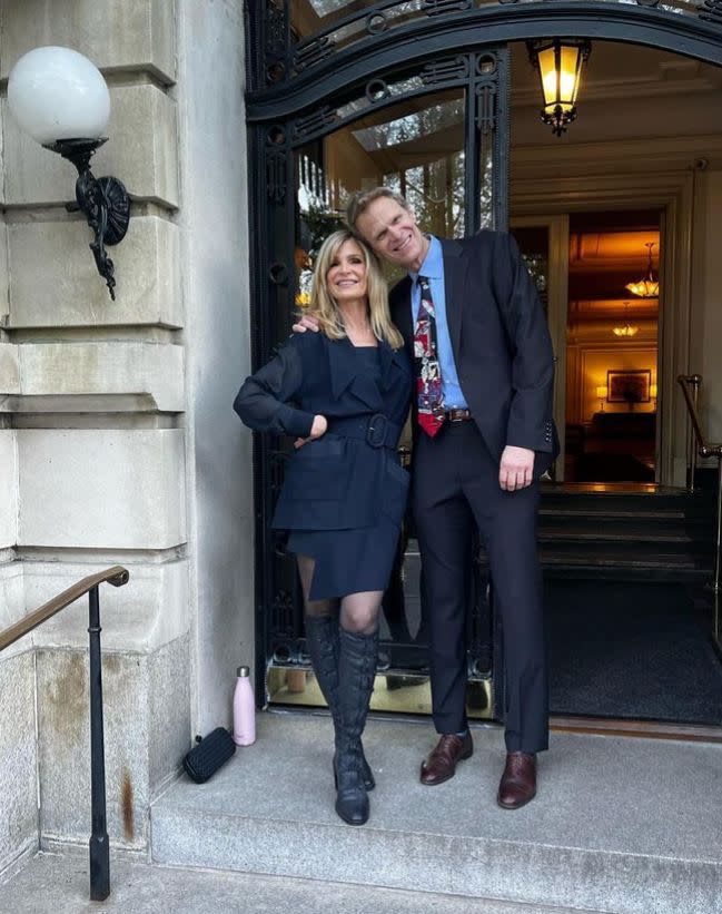 Kyra Sedgwick standing with her brother