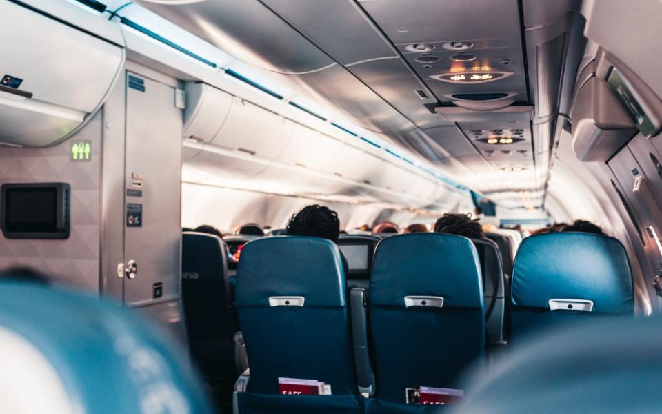 Plane seats alongside toilets