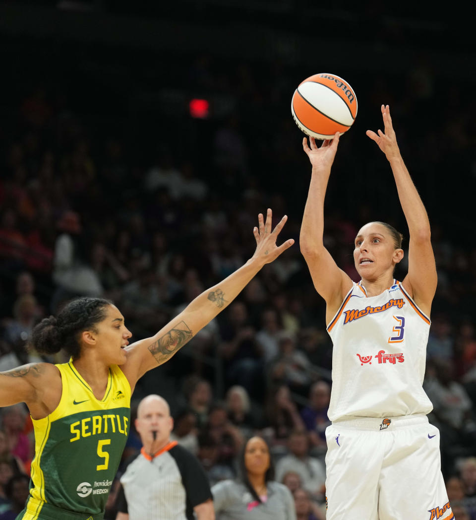 Phoenix Mercury guard Diana Taurasi (3) shoots over Seattle Storm storm forward Gabby Williams (5) during the first half on Aug. 5, 2023, at Footprint Center in Phoenix.