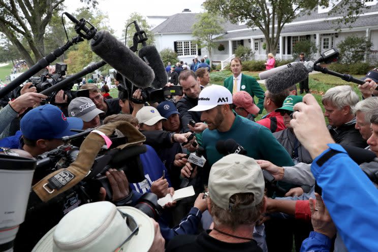 Dustin Johnson talks to the media after withdrawing from the Masters. (AP)