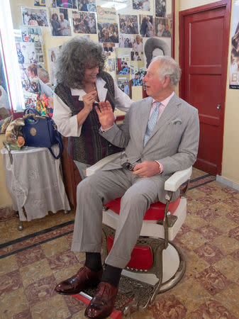 Britain's Prince Charles visits a barbershop in Havana, Cuba March 25, 2019. Arthur Edwards/Pool via REUTERS