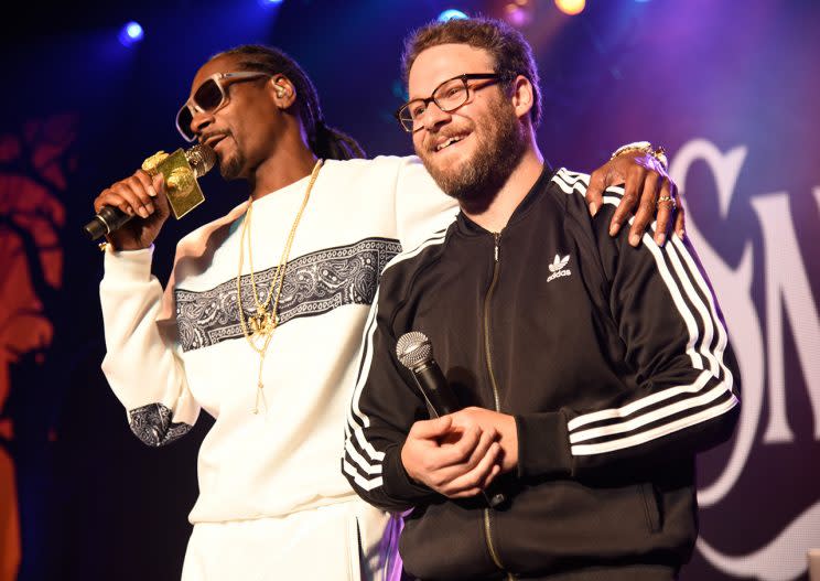 You can always count on Snoop Dogg (with Seth Rogen) to get the party started. (Photo: Jeff Vespa/Getty Images)