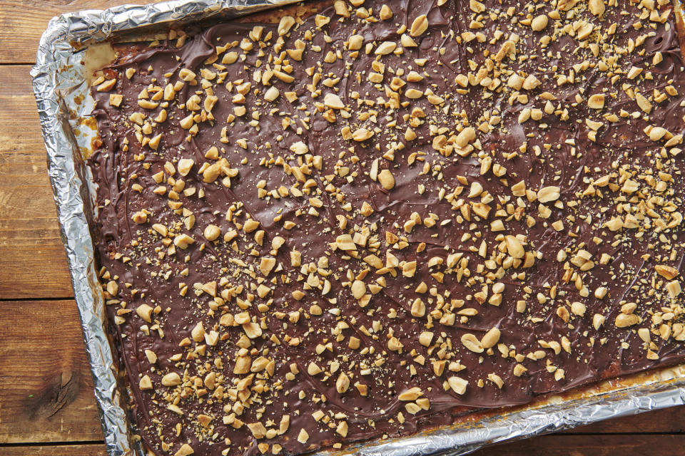 This photo shows chocolate toffee covered matzoh. Chocolate-covered caramel matzo, also known as Matzoh Buttercrunch, has become a popular Passover dessert. (Cheyenne Cohen via AP).