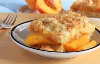 <p>Peach cobbler is one of the most <a href="https://www.thedailymeal.com/cook/southern-recipes-to-try?referrer=yahoo&category=beauty_food&include_utm=1&utm_medium=referral&utm_source=yahoo&utm_campaign=feed" rel="nofollow noopener" target="_blank" data-ylk="slk:iconic Southern dishes that everyone in America needs to try;elm:context_link;itc:0;sec:content-canvas" class="link ">iconic Southern dishes that everyone in America needs to try</a>, and while fresh peaches are ideal, you can swap them for frozen peaches so you can enjoy this dessert any time of year.</p> <p><a href="https://www.thedailymeal.com/recipes/old-fashioned-peach-cobbler?referrer=yahoo&category=beauty_food&include_utm=1&utm_medium=referral&utm_source=yahoo&utm_campaign=feed" rel="nofollow noopener" target="_blank" data-ylk="slk:For the Old-Fashioned Peach Cobbler recipe, click here.;elm:context_link;itc:0;sec:content-canvas" class="link ">For the Old-Fashioned Peach Cobbler recipe, click here.</a></p>