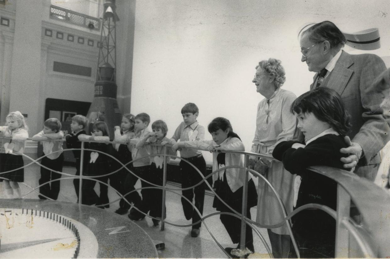 1984 - Mrs. and Mr. Walter English and students of St. Pius X, from a second grade class visit COSI.