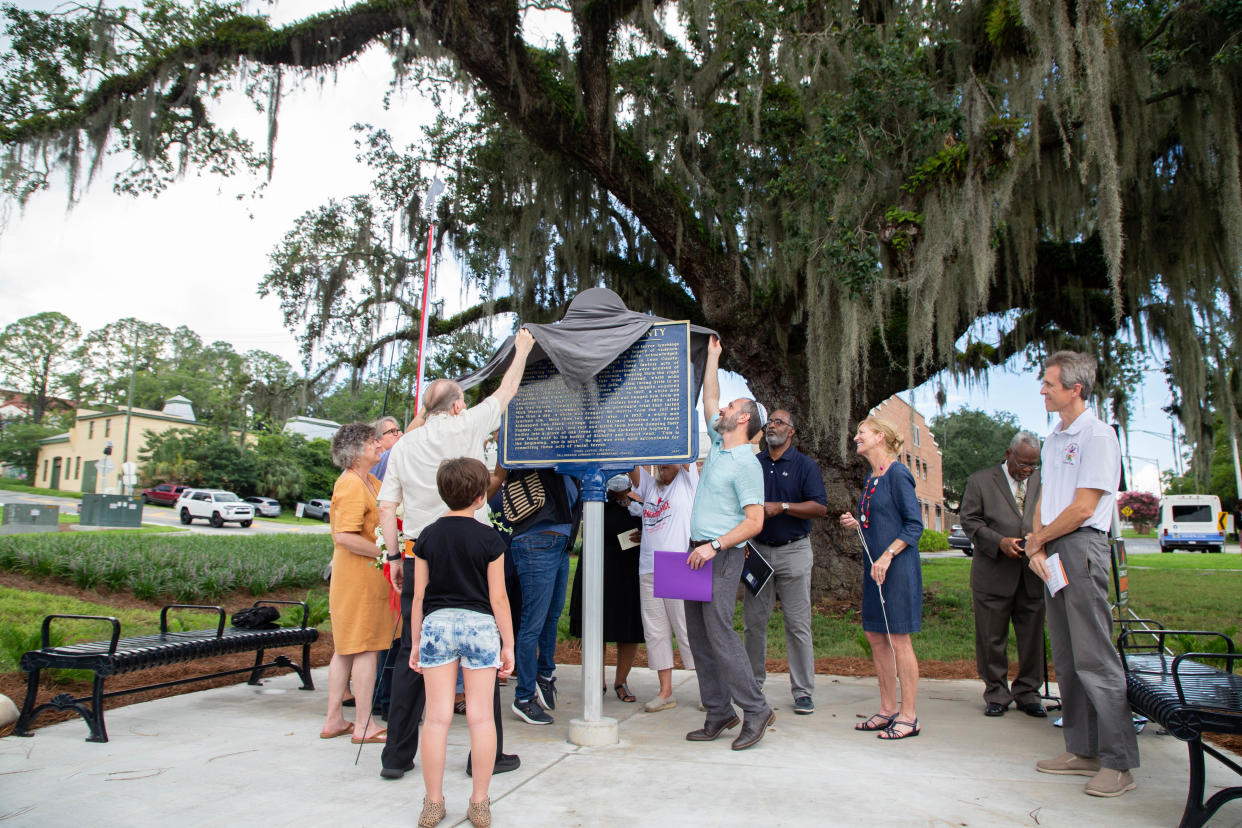 A new historical marker in remembrance of four Leon County lynching victims made possible by the Tallahassee Community Remembrance Project and the Equal Justice Initiative is revealed in Cascades Park Saturday, July 17, 2021. 