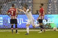 /rm1-0/ celebrates after he scored during the Spanish Super Cup final soccer match between Real Madrid and Athletic Bilbao at King Fahd stadium in Riyadh, Saudi Arabia, Sunday, Jan. 16, 2022. (AP Photo/Hassan Ammar)