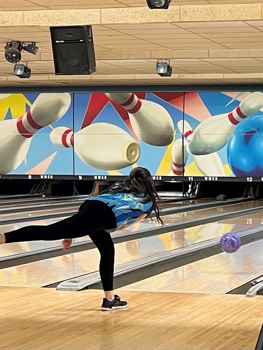 River Valley's Gabi Peak fires a shot during the Division II girls bowling state championships Friday at Wayne Webb's Columbus Bowl.