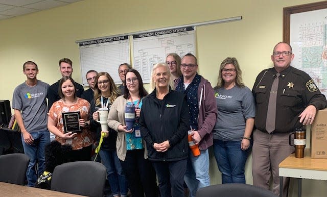 Representatives from Mercury Broadband of Schoolcraft acknowledged St. Joseph County Central Dispatch last week in advance of First Responders Day.