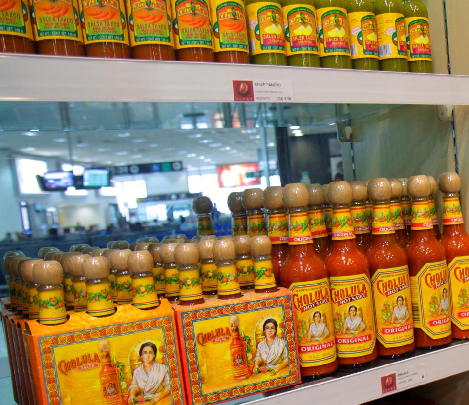 Cholula hot sauce on shelves in store