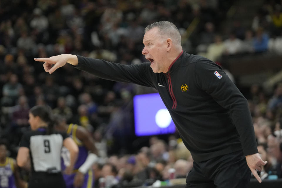 Denver Nuggets coach Michael Malone shouts to the team during the second half of an NBA basketball game against the Utah Jazz on Wednesday, Jan. 10, 2024, in Salt Lake City. (AP Photo/Rick Bowmer)