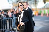 <p>The Victoria’s Secret veteran made her entrance into the Grand Palais rocking a black-and-white ensemble. <em>(Photo: Getty Images)</em> </p>