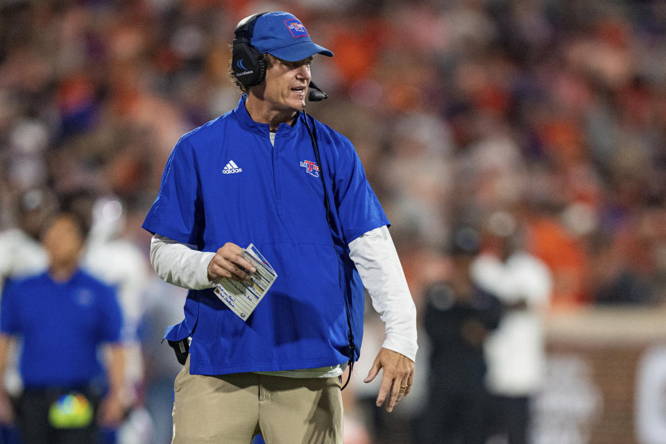 Louisiana Tech coach Sonny Cumbie watches during the first half of the team's NCAA college football game against Clemson on Saturday, Sept. 17, 2022, in Clemson, S.C. (AP Photo/Jacob Kupferman)