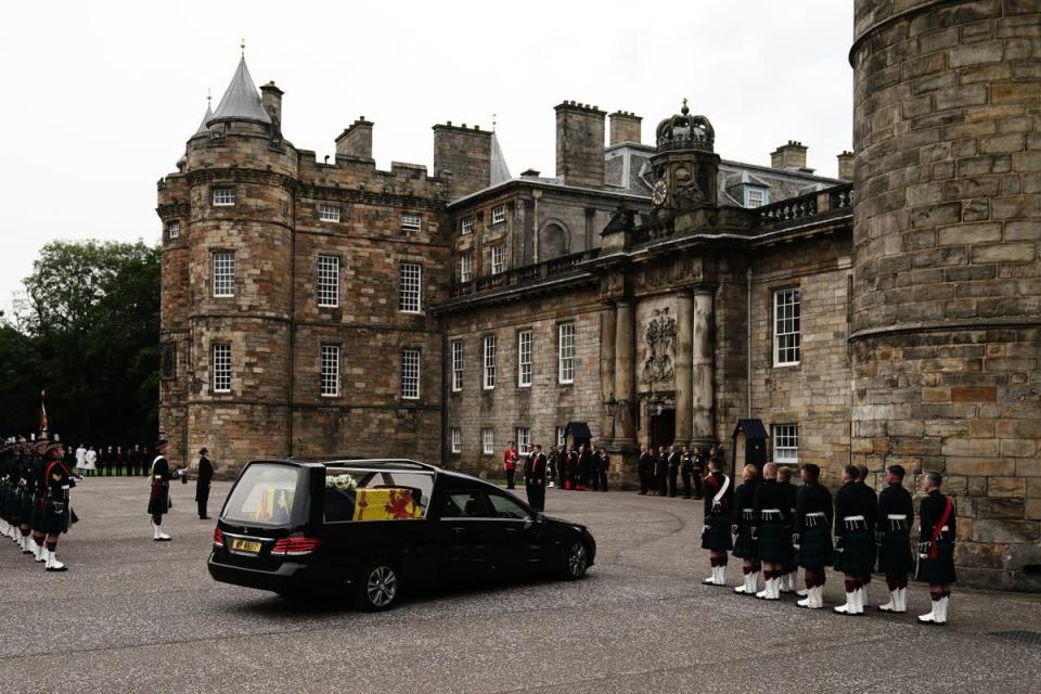 The hearse carrying the coffin of the Queen completes its journey from Balmoral to the Palace of Holyroodhouse in Edinburgh (Aaron Chown/PA) (PA Wire)