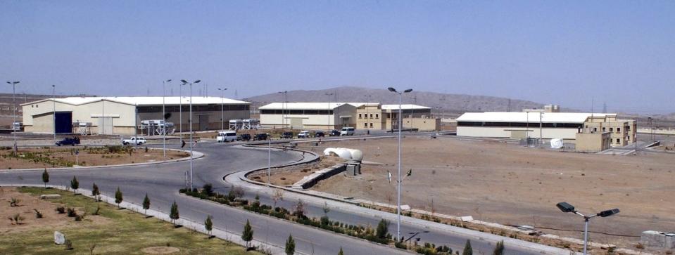 FILE - The Natanz uranium enrichment facility buildings, south of Tehran, Iran, is seen in this March 30, 2005, file photo. A new underground facility at the Natanz enrichment site may put centrifuges beyond the range of a massive so-called “bunker buster” bomb earlier developed by the U.S. military, according experts and satellite photos analyzed by The Associated Press in May 2023. (AP Photo/Vahid Salemi, File)