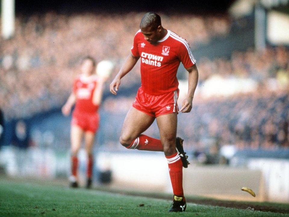 Liverpool’s John Barnes kicks a banana thrown at him from the crowd at Goodison Park in 1988 (Getty Images)