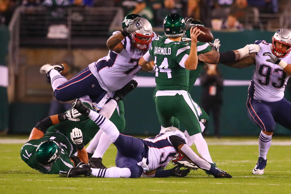 New England Patriots defensive tackle Danny Shelton (71) pressures New York Jets quarterback Sam Darnold (14) during the Patriots' win. (Getty Images)