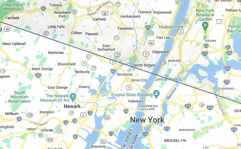 eclipse map graphic showing the path of totality cutting through New York City.