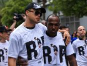 <p>Giancarlo Stanton and Marcell Ozuna return to the stadium after surrounding the hearse carrying Miami Marlins pitcher Jose Fernandez to pay their respects on September 28, 2016 in Miami, Florida. Mr. Fernandez was killed in a weekend boat crash in Miami Beach along with two friends. (Photo by Rob Foldy/Getty Images) </p>