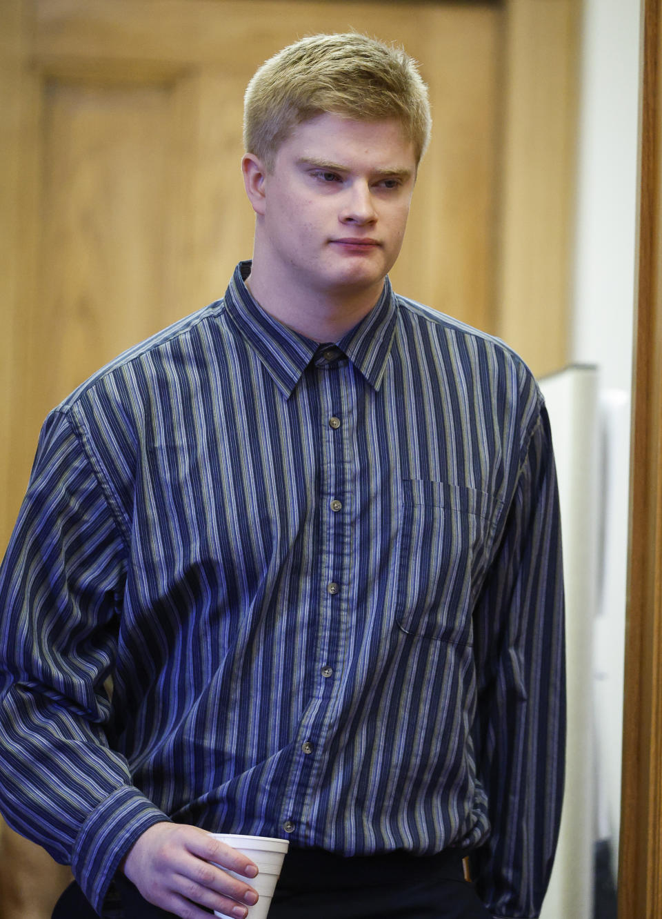 Jeremy Goodale enters the courtroom during his sentence hearing at the Jefferson County Courthouse in Fairfield, Iowa, on Wednesday, Nov. 15, 2023. Goodale, along with Willard Miller, pleaded guilty to murdering Spanish teacher Nohema Graber and concealing her body under a tarp and wheelbarrow in a wooded area of a park. (Jim Slosiarek/The Gazette/Pool Photo via AP)