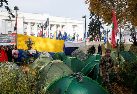 An opposition protester is seen in a tent camp set up near the Ukrainian parliament building in Kiev, Ukraine October 19, 2017. REUTERS/Gleb Garanich