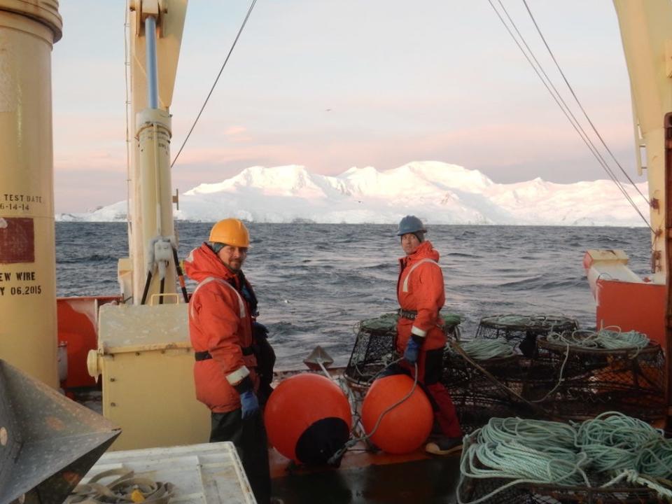 Thomas Desvignes (left), a fish biologist with the University of Oregon, awaits the return of the next trap, looking to see if it contains more infected, diseased fish in Dallmann Bay, Antarctica in 2018.