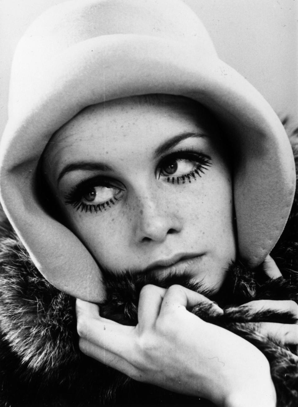 Twiggy at age 16, with her signature lashes stealing the spotlight.