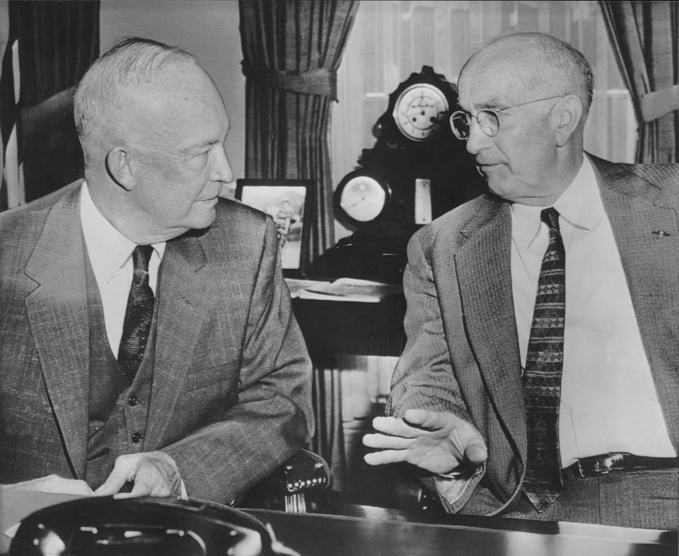 Louisville City Schools superintendent Omer Carmichael right, explains to President Dwight Eisenhower at the White House how Louisville integrated its schools smoothly. Associated Press Photo. 1957