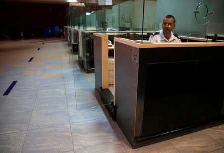 Egypt's officers who check identifications are seen at passenger security checkpoint at Sharm el-Sheikh airport, Egypt October 31, 2016. REUTERS/Amr Abdallah Dalsh