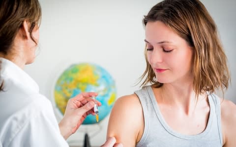 A patient is given a vaccination by a doctor (stock image) - Credit: Rex