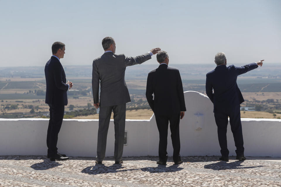From left to right: Spain's Prime Minister Pedro Sanchez, Spain's King Felipe VI, Portugal's President Marcelo Rebelo de Sousa and Portugal's Prime Minister Antonio Costa during a ceremony to mark the reopening of the Portugal/Spain border in Elvas, Portugal, Wednesday, July 1, 2020. The border was closed for three and a half months due to the coronavirus pandemic. (AP Photo/Armando Franca)