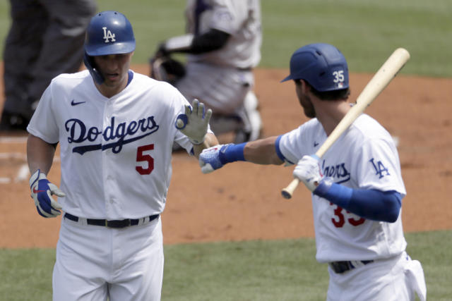 Dodgers pound 7 homers, beat Rockies 11-3 to finish sweep