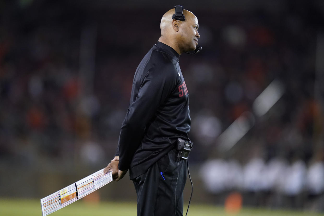 Stanford head coach David Shaw listens to a call by the referee during the first half of the team's NCAA college football game against Oregon State in Stanford, Calif., Saturday, Oct. 8, 2022. (AP Photo/Godofredo A. Vásquez)
