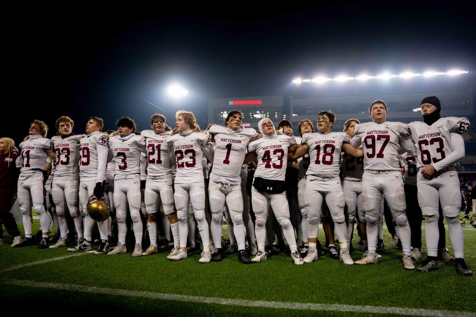 Watterson players chant the school's alma mater after a 27-7 loss to Toledo Central Catholic in last year's Division III state final.