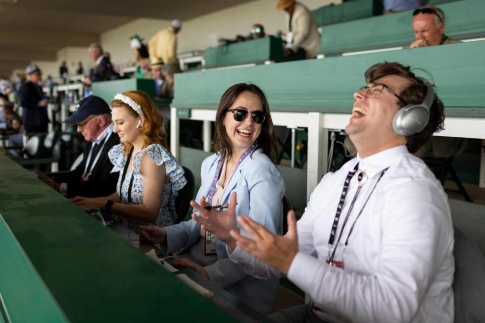 Lexington Herald-Leader sports reporter Cameron Drummond shares a laugh with Herald-Leader colleague Caroline Makauskas while researching bets ahead of Saturday’s 149th Kentucky Derby at Churchill Downs. Drummond bet on three different horses to win the Derby: Angel of Empire, Jace’s Road and Mage.