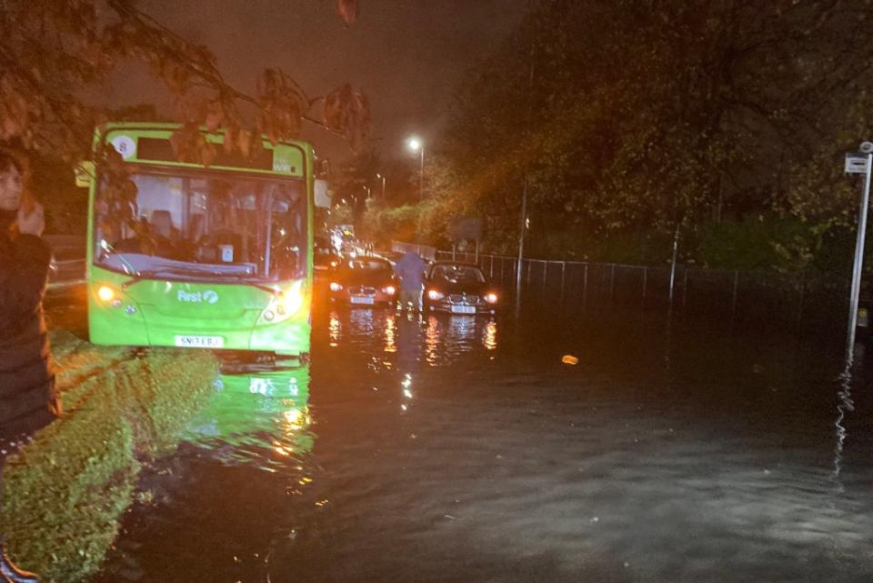 Drivers abandoned their vehicles in the heavy flooding (Twitter/Professor Larissa Naylor)