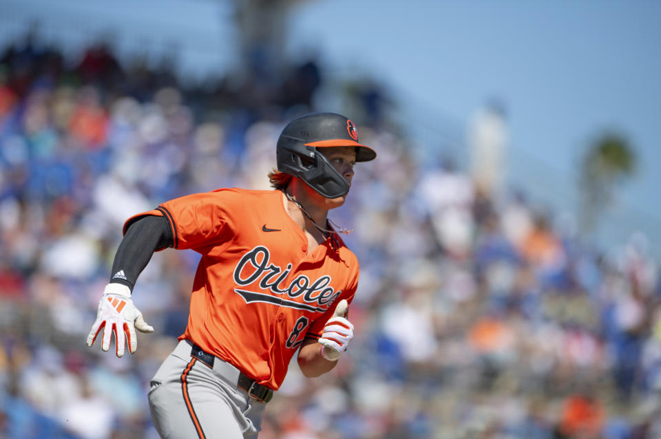 Baltimore Orioles second baseman Jackson Holliday rounds first base after hitting a home run during a baseball game against the Toronto Blue Jays, Tuesday, March 19, 2024, in Dunedin, Fla. (Mark Taylor/The Canadian Press via AP)