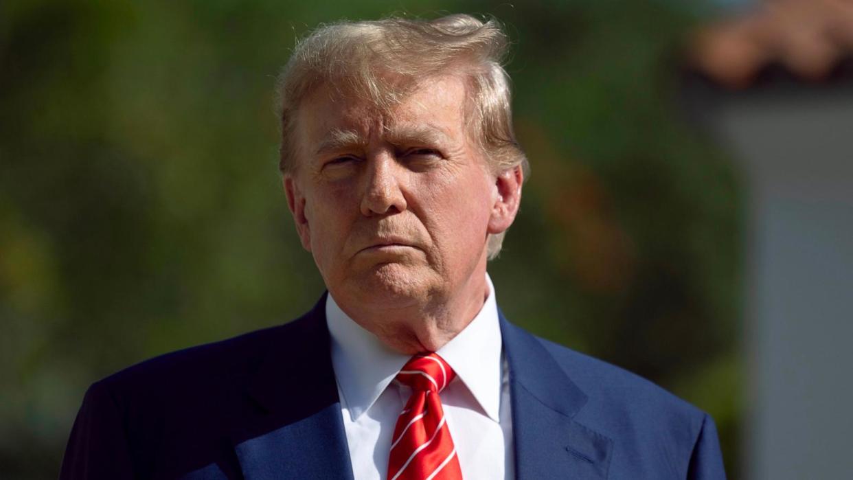 PHOTO: Former U.S. President Donald Trump speaks to the media after voting at a polling station setup in the Morton and Barbara Mandel Recreation Center, Mar. 19, 2024, in Palm Beach, Fla. (Joe Raedle/Getty Images)