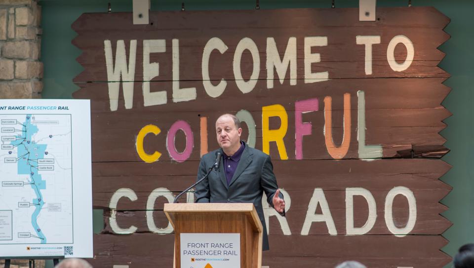 Gov. Jared Polis addressed a crowd at History Colorado Center during a formal announcement on Wednesday, Dec. 13, 2023 of the Front Range Passenger Rail Project's inclusion in the Federal Railroad Administration's Corridor Identification and Development Program.